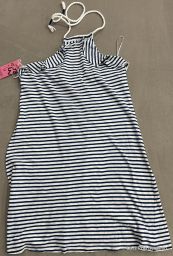 VESTITO COPRICOSTUME