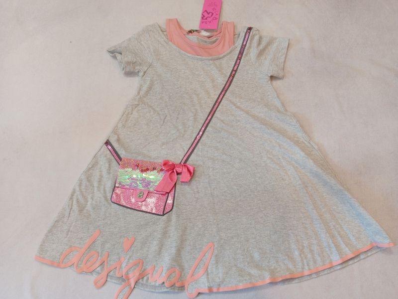 ABITO DESIGUAL